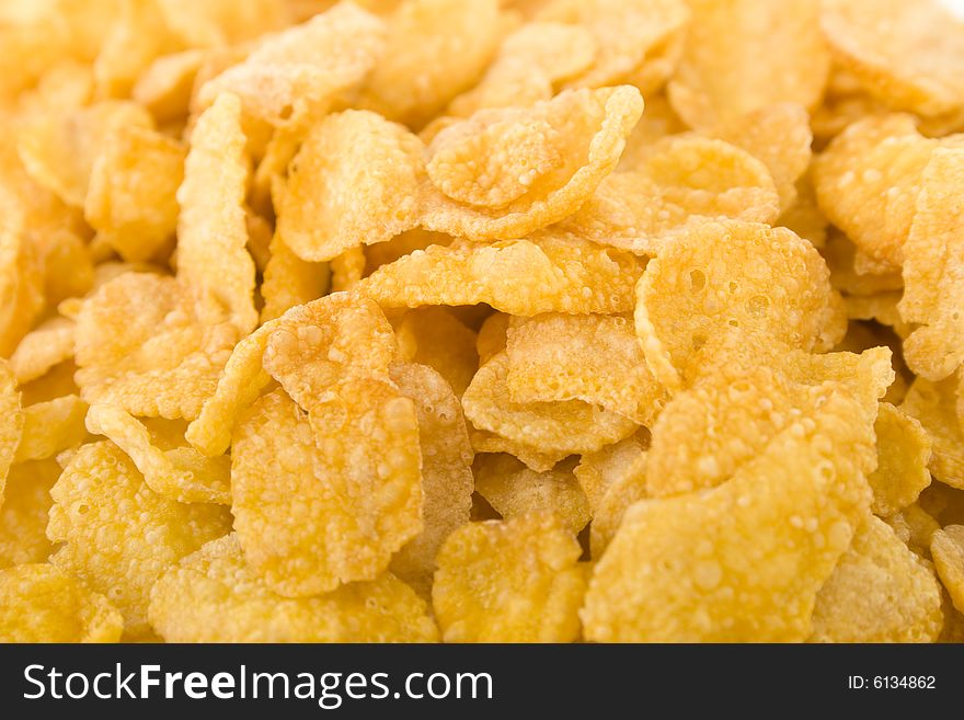 Golden corn flakes macro shot. Golden corn flakes macro shot