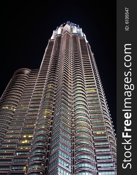 Twin towers seen from below by night