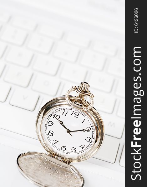 Pocket watch with white keyboard. Pocket watch with white keyboard