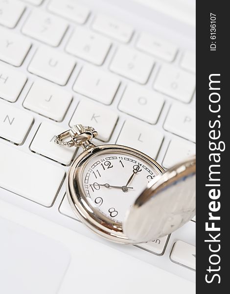 Pocket watch with white keyboard. Pocket watch with white keyboard