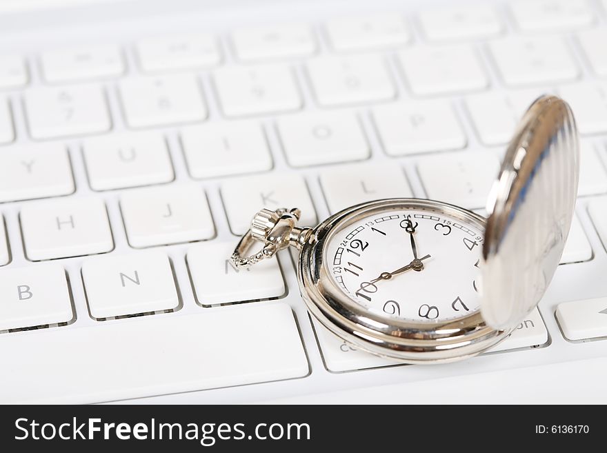 Pocket watch with white keyboard. Pocket watch with white keyboard