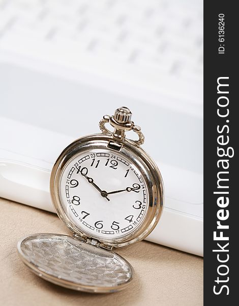 Pocket watch with white keyboard. Pocket watch with white keyboard