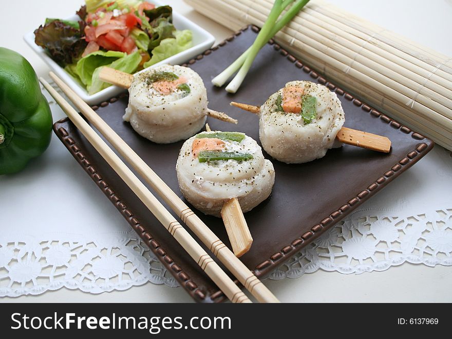 3 pangasius fish rolls filled with salmon