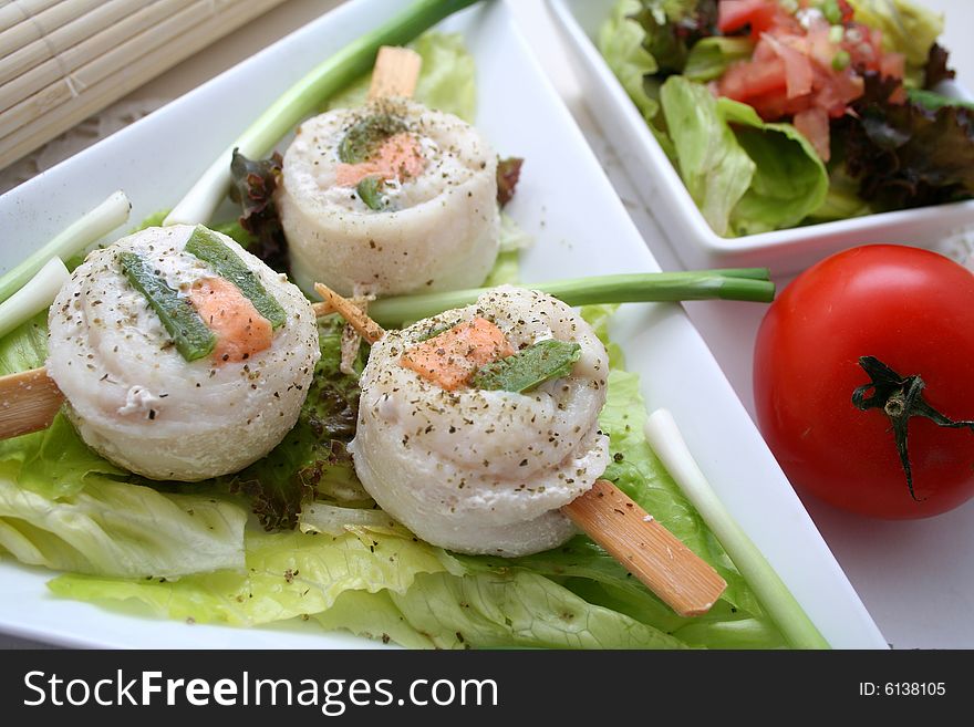 3 pangasius fish rolls filled with salmon