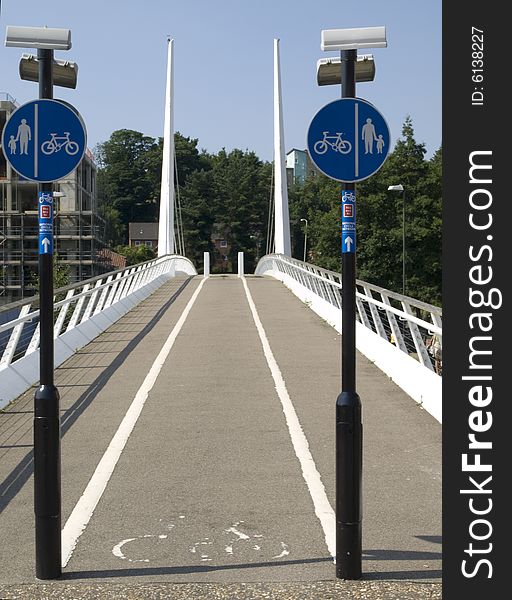 Cycle lane going across the bridge with symetrical posts. Cycle lane going across the bridge with symetrical posts