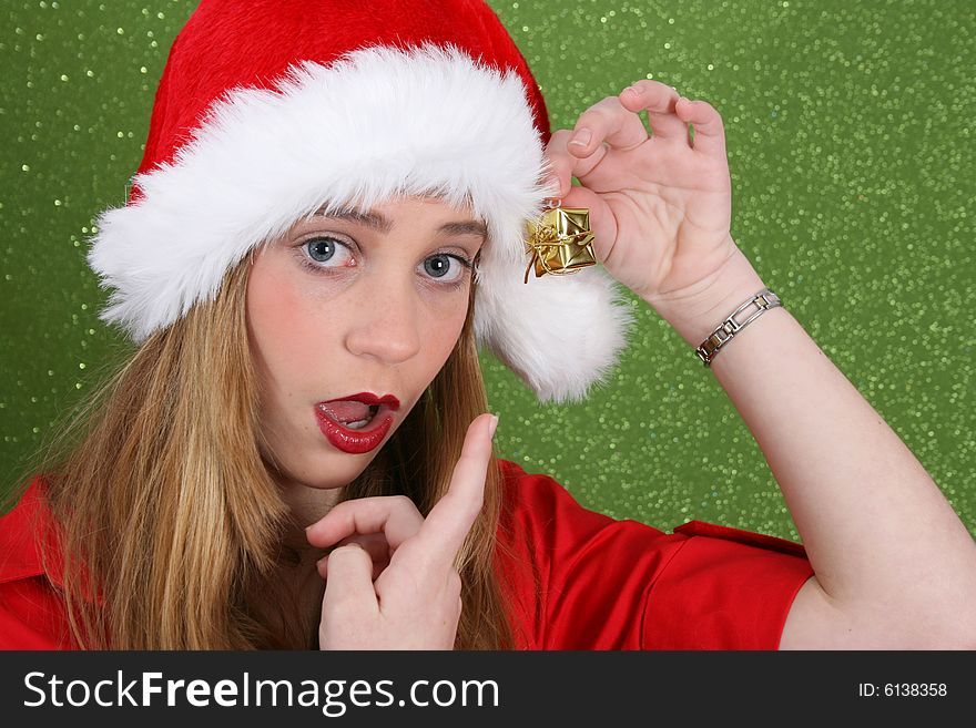 Teenager with red lips wearing a christmas hat. Teenager with red lips wearing a christmas hat
