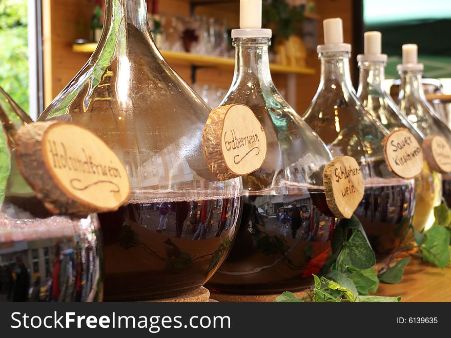Large bottles with wine stand for test
