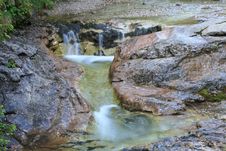 Mountain Stream With Small Waterfall Stock Photo