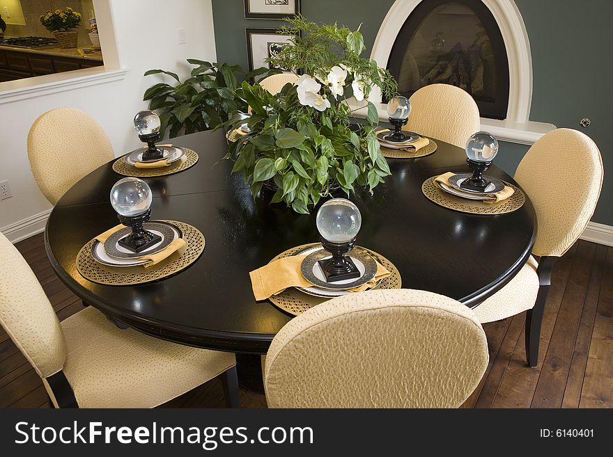 Dining room with modern tableware and decor. Dining room with modern tableware and decor.