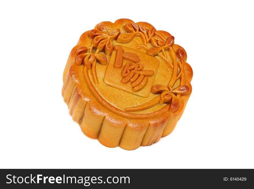 Close up of a mooncake over white background.