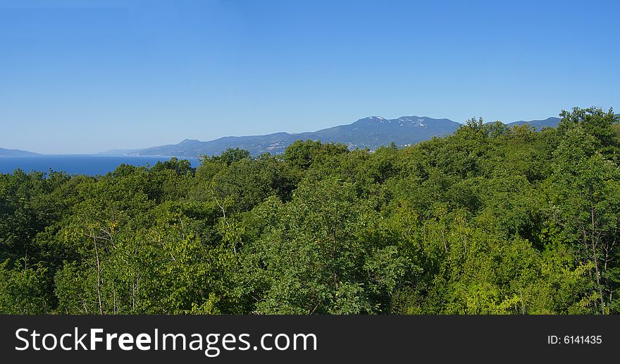 Landscape panorama of Kvarner Bay in Croatia, view of the coastline and Mountain Ucka, sea and Cres Island

*horizontal panoramic image, 2 images stitched together 
**with space for text (copyspace). Landscape panorama of Kvarner Bay in Croatia, view of the coastline and Mountain Ucka, sea and Cres Island

*horizontal panoramic image, 2 images stitched together 
**with space for text (copyspace)