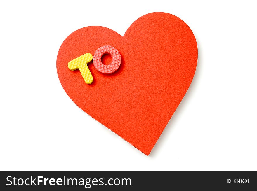 Heart and foam letters isolated over a white background