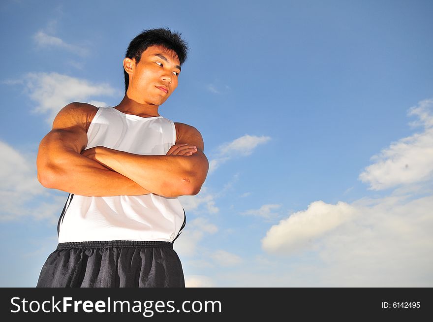 Asian Sportsman Thinking Hard