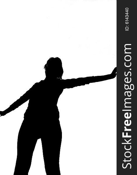 Silhouette of girl stretching her arms out. Silhouette of girl stretching her arms out.