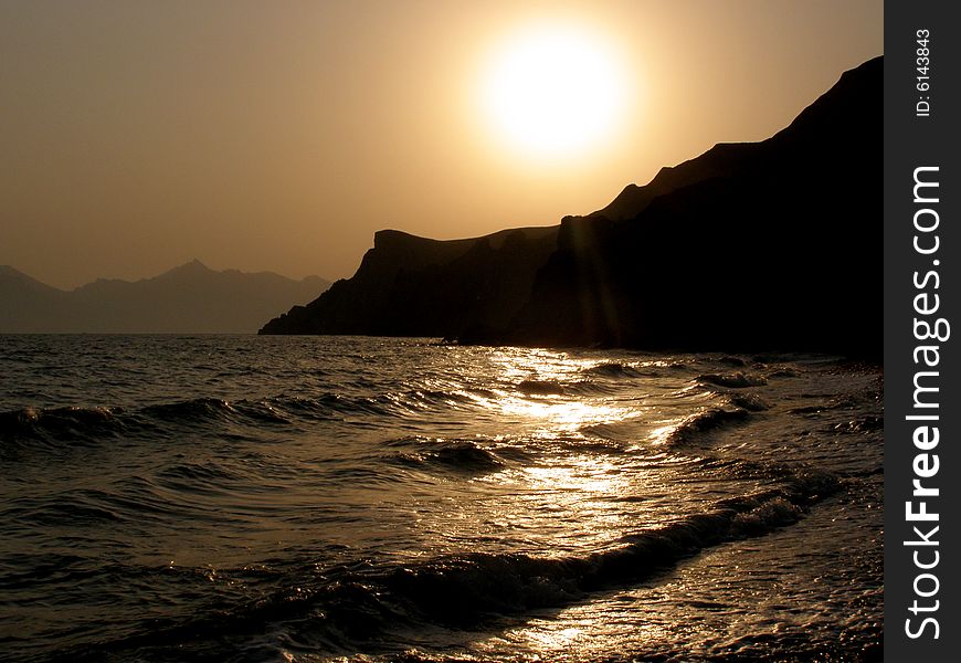Sea sunset (the Crimea coast, summer, wave, surf, evening)
