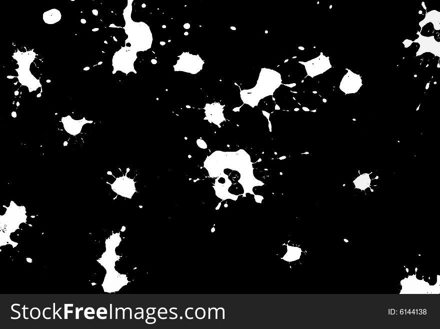 White splatters on black background