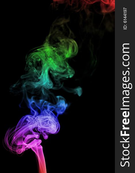 Color smoke on black background