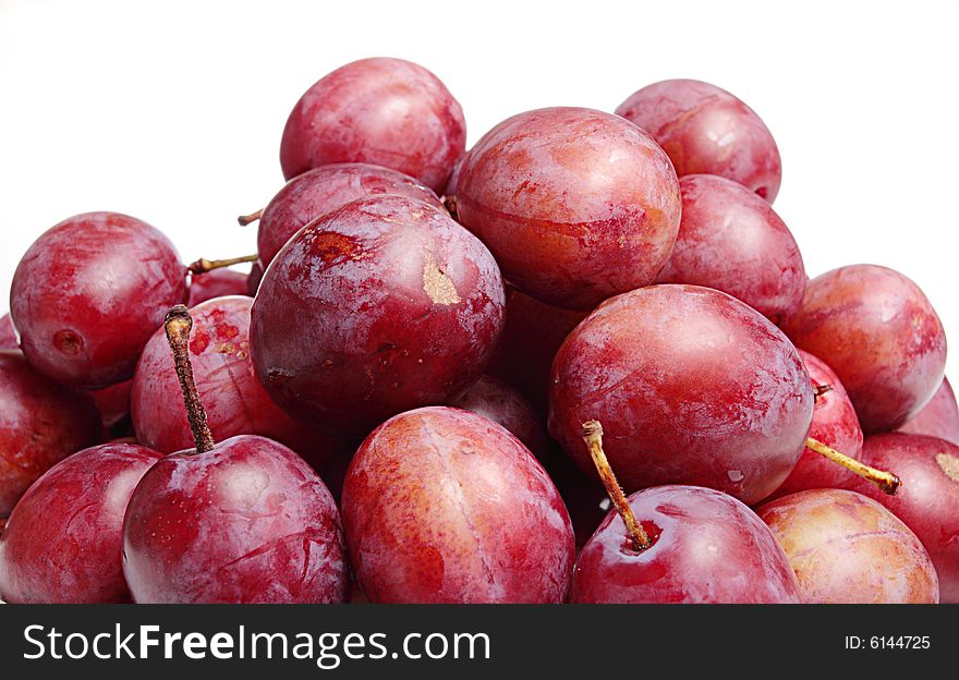 Plums on a white background