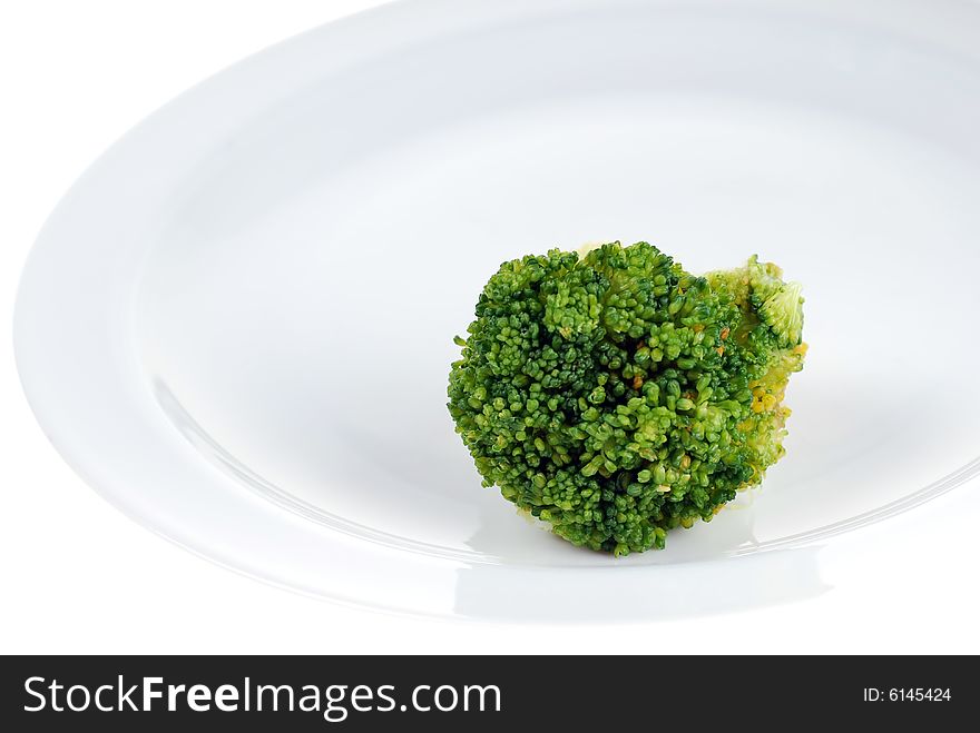 Broccoli on white service plate,beauty of green. Broccoli on white service plate,beauty of green