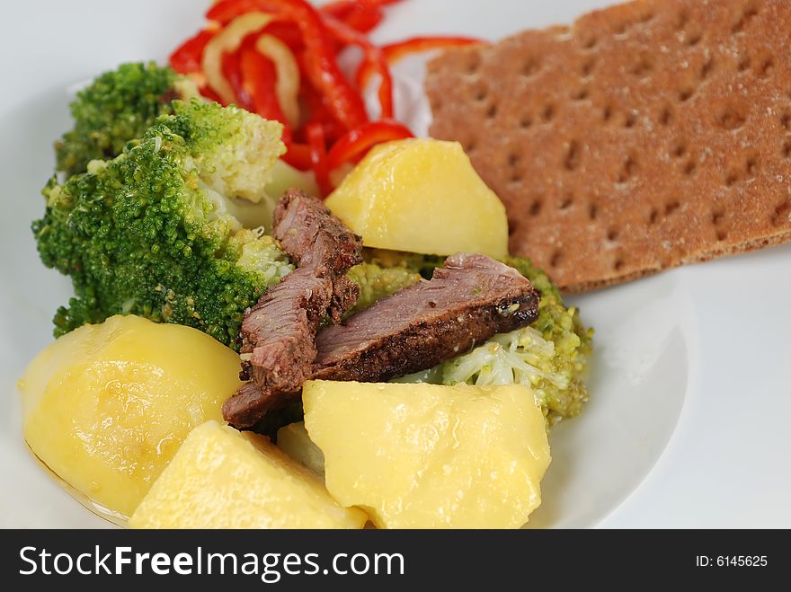 Tender fillet beef steak salad with mustard sauced broccoli,red pepper and boiled potato