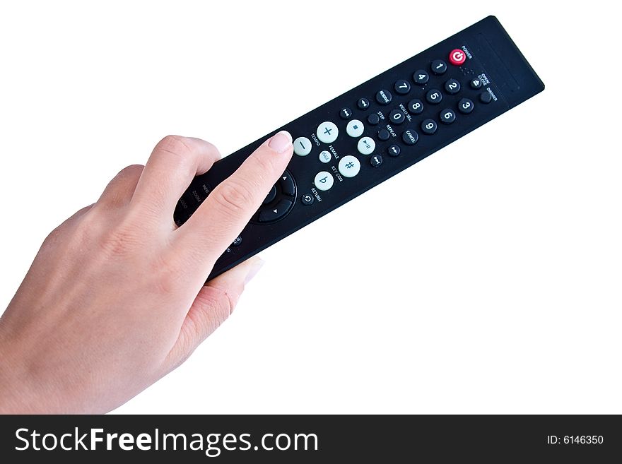 Female hand with a remote control.