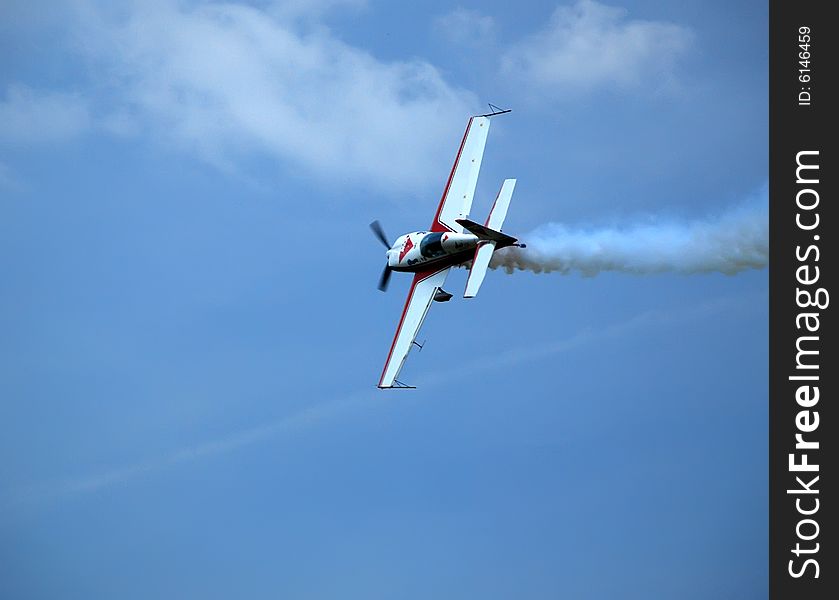 Aircraft in the acrobatic flight. Aircraft in the acrobatic flight