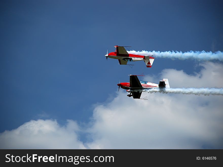 Two Aircrafta in the acrobatic flight. Two Aircrafta in the acrobatic flight
