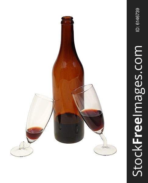 Bottle of alcohol and two wine glasses isolated on white background
