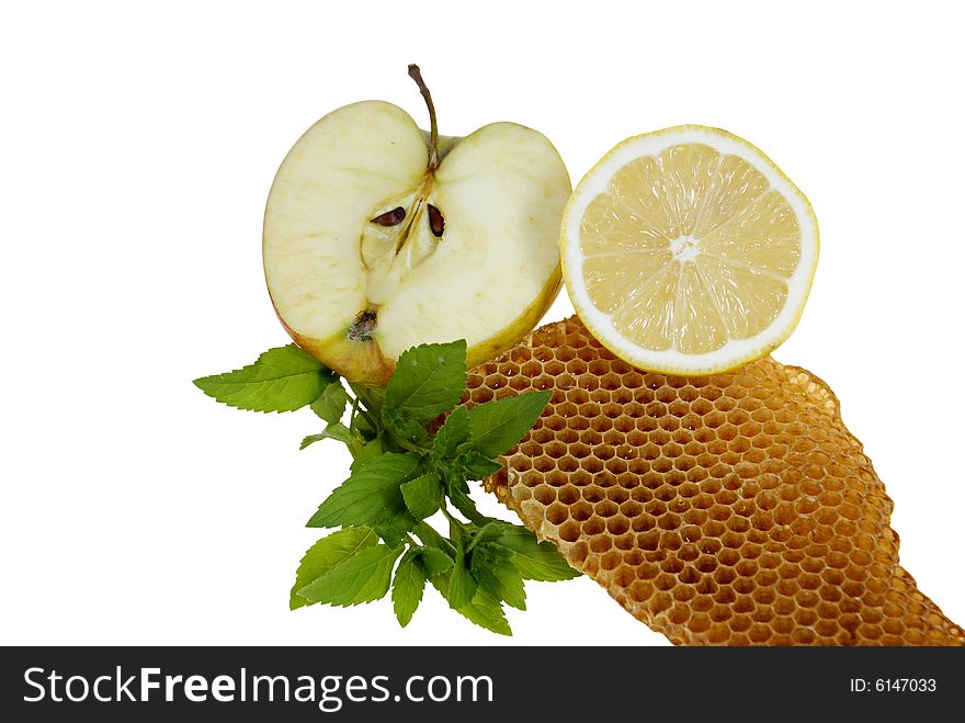 Fruits with mint and honeycomb isolated on white background. Fruits with mint and honeycomb isolated on white background