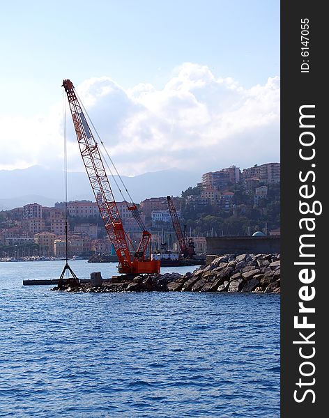 A platform and a crane in a harbour. A platform and a crane in a harbour