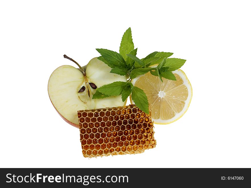 Fruits with mint and honeycomb isolated on white background. Fruits with mint and honeycomb isolated on white background