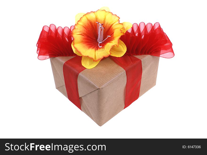 Grey package with red ribbon and flower isolated on white background
