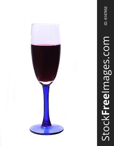 Glass with red wine on the white background