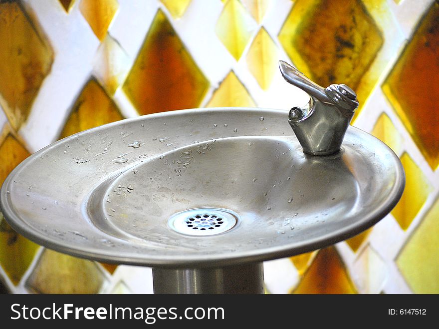Water fountain located in a place of worship.