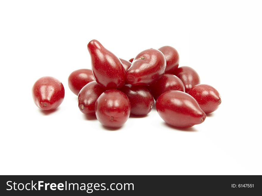 Red exotic berries on white background