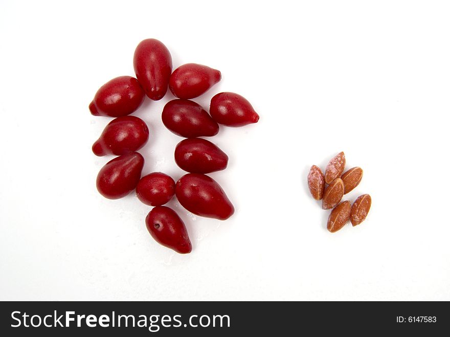 Red exotic berries on white background