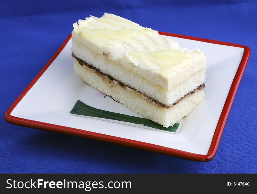 Sweet and tasty cake piece in plate. Sweet and tasty cake piece in plate