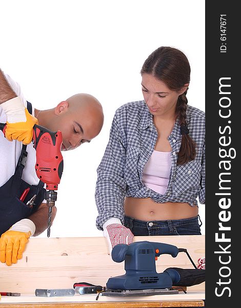 Construction workers at work on white background