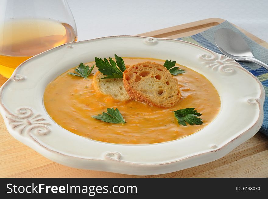 Bowl of delicious and healthy homemade carrot soup.