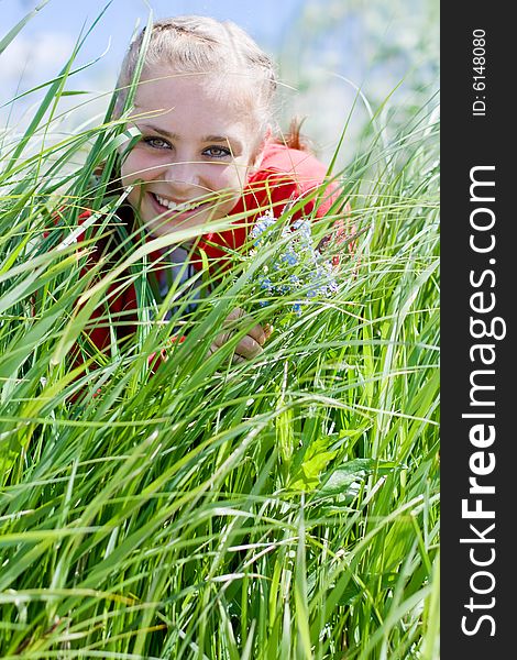 Beautiful girl gathering flowers. 4