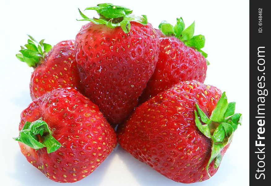 Five strawberrys stacked on a white background. Five strawberrys stacked on a white background