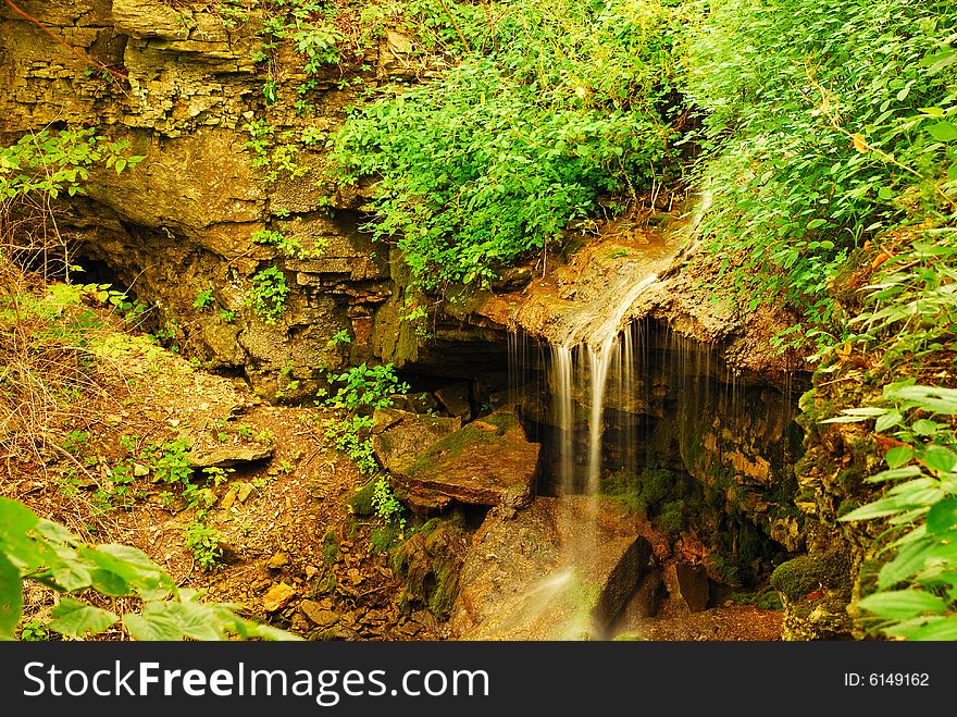 This is a bird eyes view of a small waterfall. This is a bird eyes view of a small waterfall.
