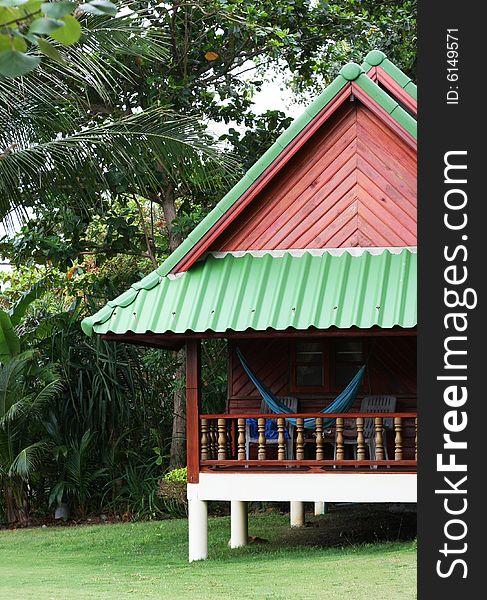 Rustic beach bungalow in Thailand - travel and tourism.