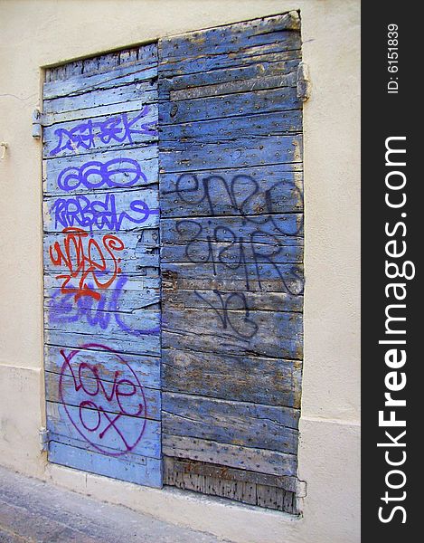 Image of graffiti on the entrance of a house in the south of France. Image of graffiti on the entrance of a house in the south of France