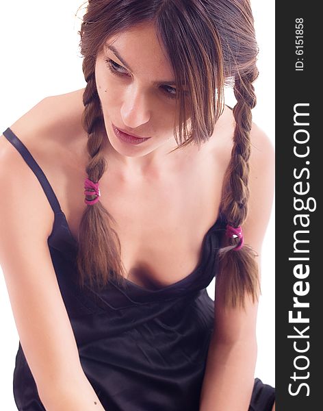 Young adult girl posing at fashion shot with queue hair. Young adult girl posing at fashion shot with queue hair