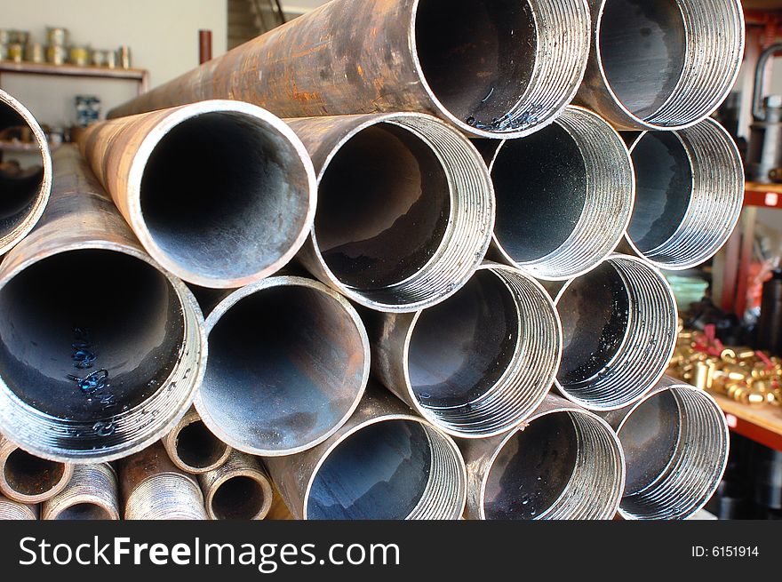 Abstract close up of a stack of steel pipes. Abstract close up of a stack of steel pipes