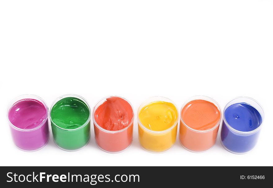 Gouache paint cans on white background
