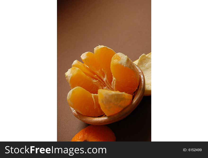 Orange in a bowl opened up like a star. Orange in a bowl opened up like a star..