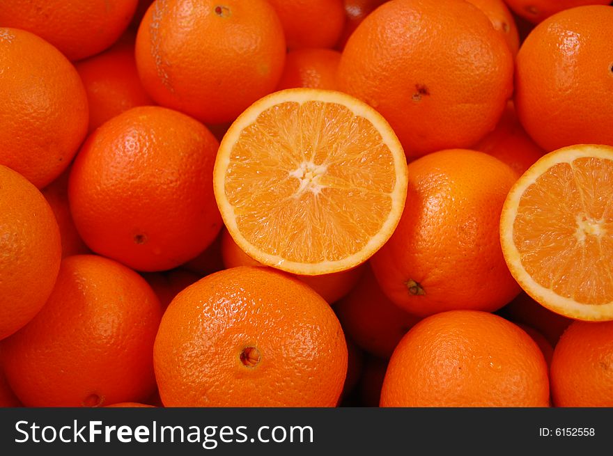Oranges bunch close up , sliced