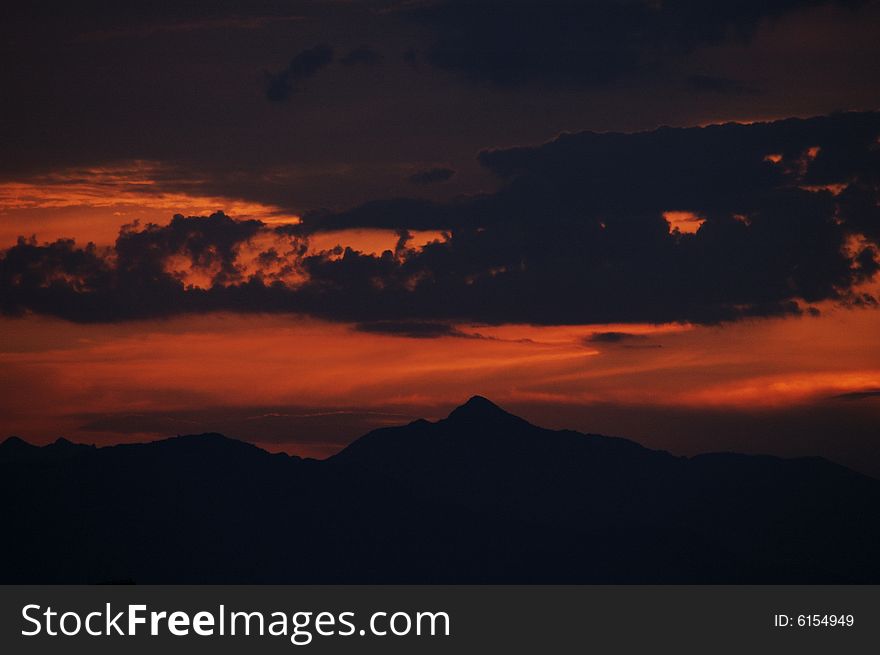 Setting sun magnificence, cloud as if by final optical fiber ignition. Setting sun magnificence, cloud as if by final optical fiber ignition